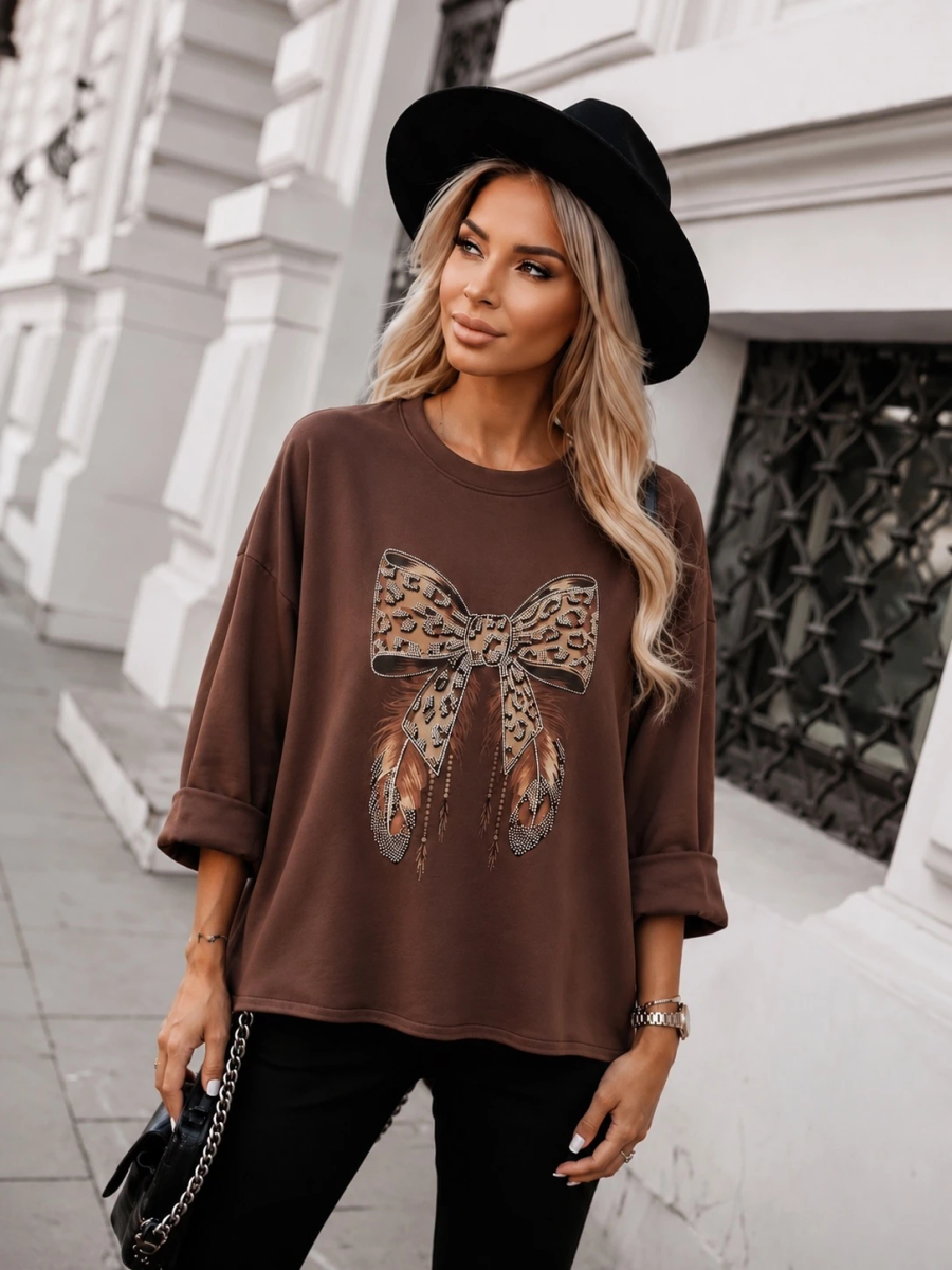 Pull oversize nœud léopard strass
