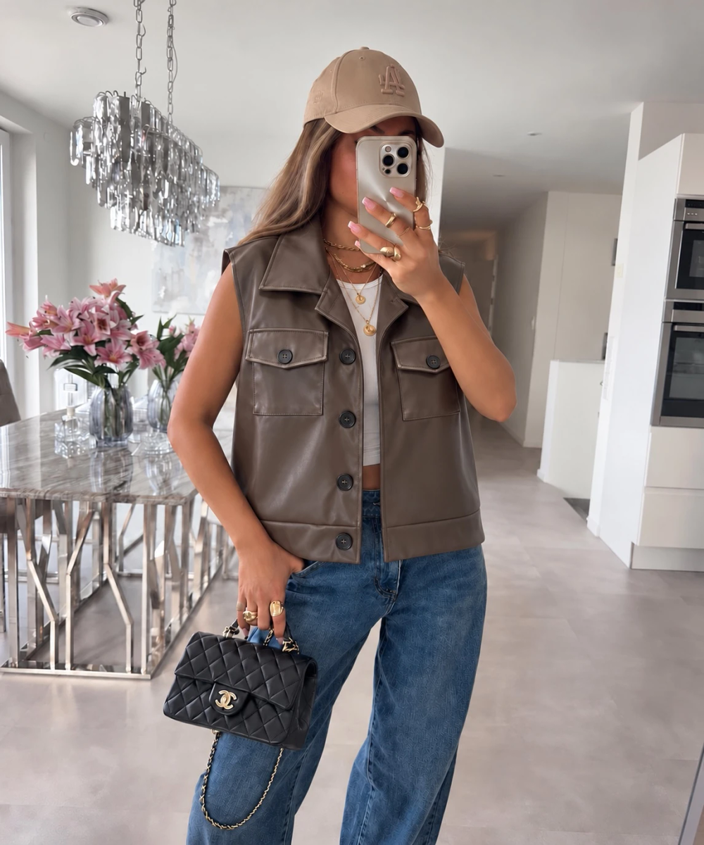 Veste sans manches en similicuir à poches poitrine